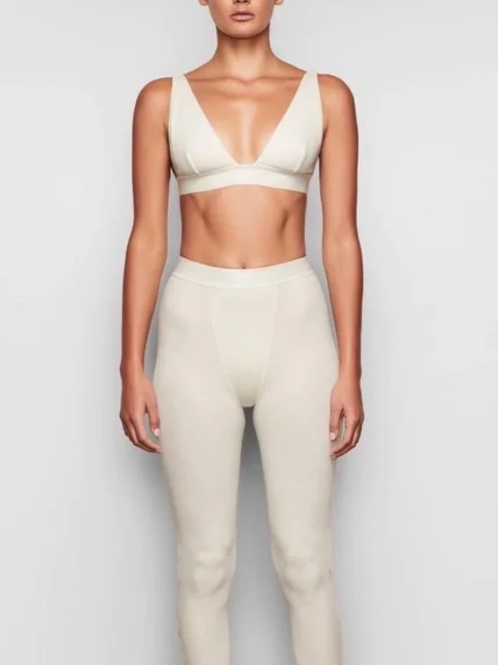 SKIMS Ribbed V-Neck Bralette and High-Waist Leggings Set in Bone